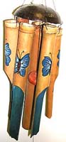 Bamboo windchime with blue color butterflies on each pipe and blue painted inside each pipe, flat half nut shell on top