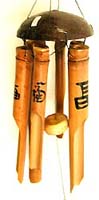 Light brown bamboo wind chime with Chinese greeting word, flat nut shell on top