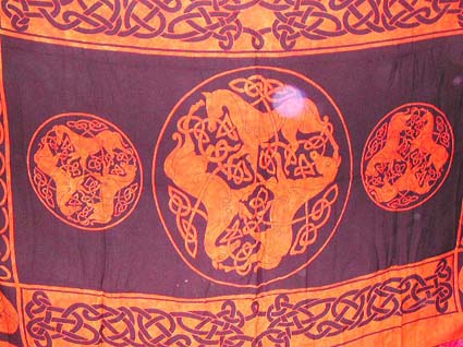Wholesale clothing and woman's fashion, Celtic tie dye malo sarong of Celtic mythology symbol- black orange background color with horse circle knotwork pattern design