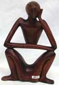 Abstract yogi man in sitting position with one hand cross on knee and one hand hoding his head