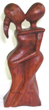 Kissing couple abstract carving, made of tropical hard wood 