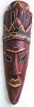 Deep brown long face mask with crown top and a black dot on forehead