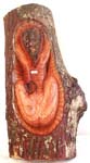 Tree stem with carved naked lady figure