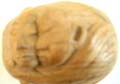 Yellow hard wood made of loving couple abstract carving