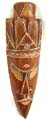 Man face brown wooden mask with sharp chin and decor on eyes and lips