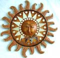 Rounded tan crack wooden wall mirro with sun face central decor and fire edge design