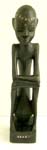 Black tribal man in sitting statue abstract carving 