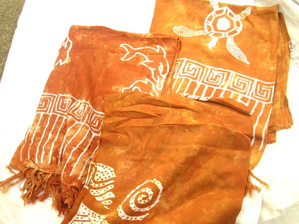 Dark orange caribbean pareo sarong with sea life design from international island wear shopping catalog