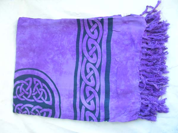 Crafted bali sarong with black celt circle knot and band along border from casual clothing outsourcing company