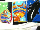 Multi colored hawaiian fish pattern on beach blanket sarong from online gift store distributor