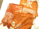 Dark orange caribbean pareo sarong with sea life design from international island wear shopping catalog