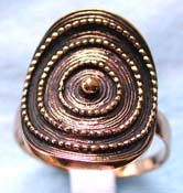  bronze ring with dotted spiral pattern decor shield shape central design