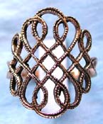 100% bronze ring with carved-out floral pattern design at center