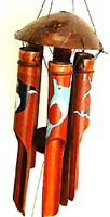 Dark brown bamboo wind chime with assorted color and design dolphin painted on each pipe, flat half nut shell on top