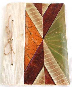 wholesale address book, wholesale Bali handmade address books embedded amid green kupu-kupu leaves, natural banana leaf, mulberry saa paper and recycling paper