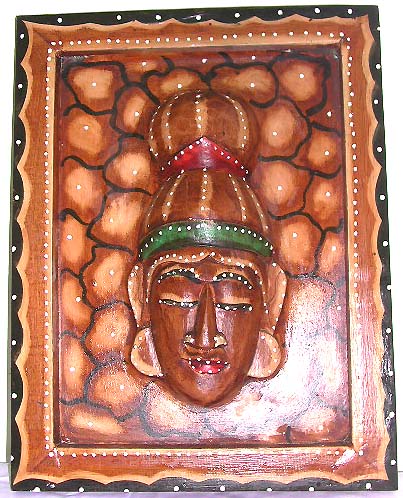 Rectangular brown wooden tribal face plaque 