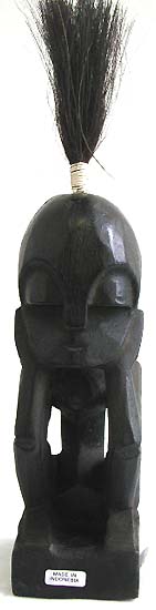 Black tribal boy with hair stick up statue