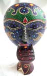 Batik dotted painting lady face mask stand with thinking motion and pray motion design