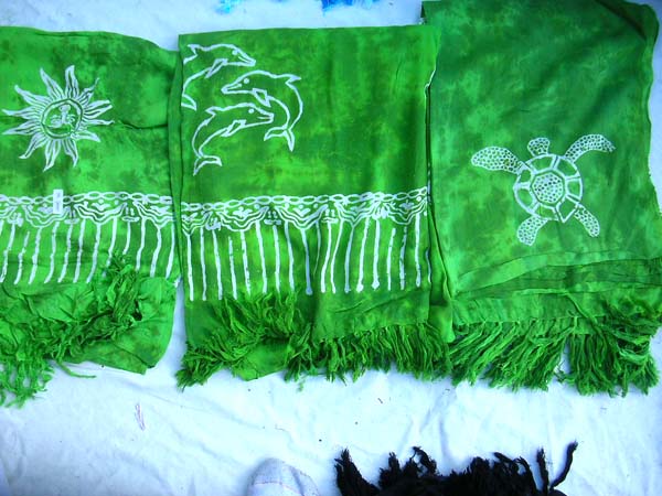 Handcrafted green tie dye batik shawl with white ocean life design from wholesale clothing exchange supplier