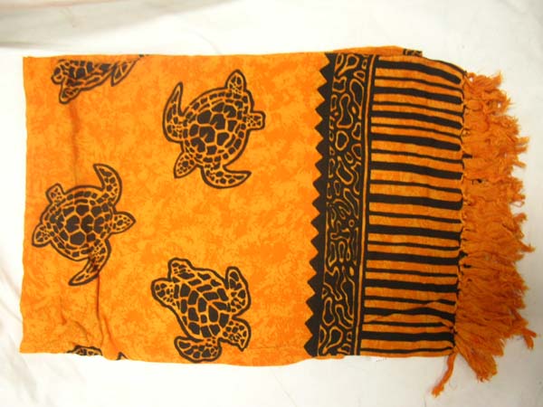 Island wear garments online, Orange indonesian sarong wrap with black turtle print theme catalog