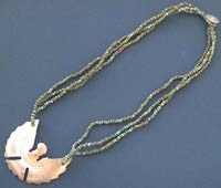Fashion necklace with an eagle seashell pendant decor in triple green beaded string design, button loop for convenience closure