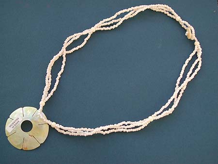 Designers fashion jewelry, triple white beaded string fashion necklace with flower seashell pendant