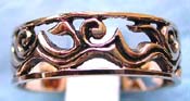  bronze ring with carved-out floral pattern decor along