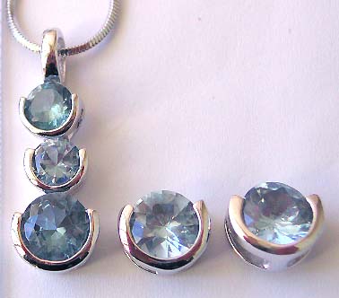 Latest fashion and jewelry catalog presenting chain necklace, 3 curve holding blue cz pendant and stud earring set